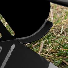 close up of black paddock blade manure collector