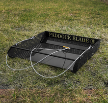 black paddock blade manure collector in paddock
